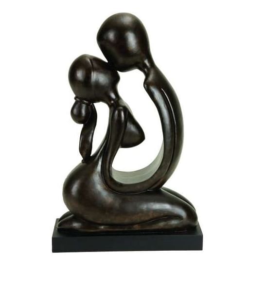 Brown People Kissing Sculpture