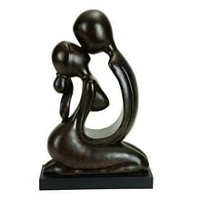Brown People Kissing Sculpture