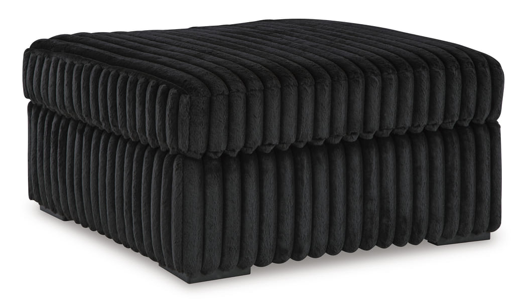 FURRY OTTOMAN IN BLACK