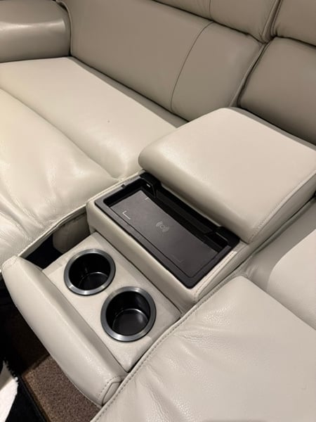 BIG AND TALL SOFA AND LOVESEAT IN GRAY LEATHER - POWER RECLINING AND POWER HEADRESTS , SPEAKER CONSOLE WITH WIRELESS CHARGING