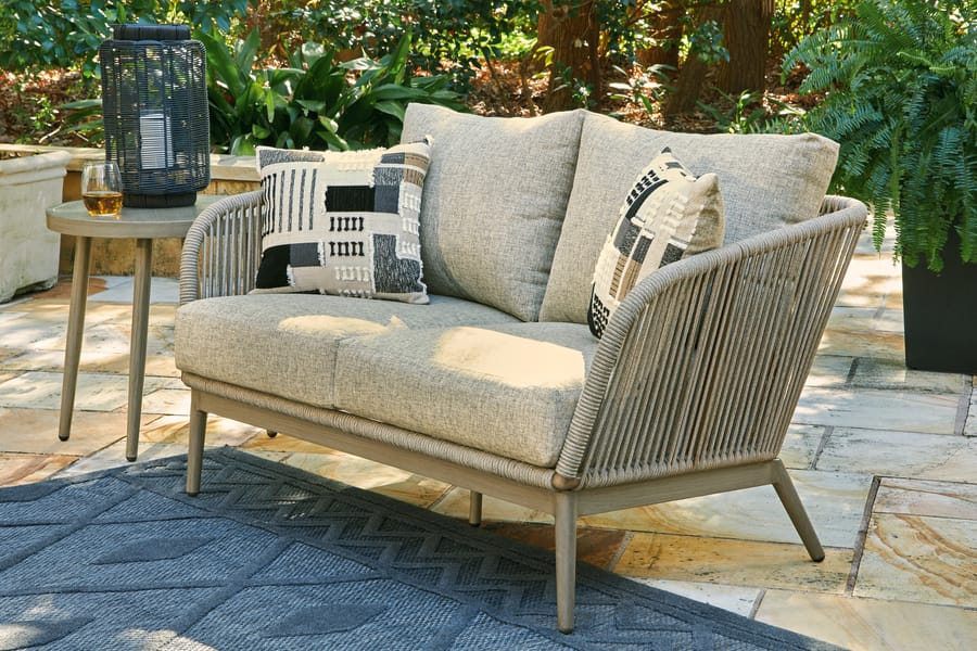 Ashley Outdoor/Patio Swiss Valley Outdoor Loveseat with Cushion P390-835
