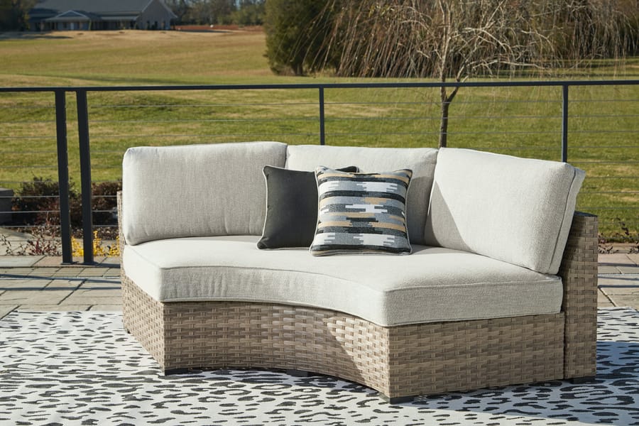 Ashley Outdoor/Patio Calworth Outdoor Curved Loveseat with Cushion P458-861