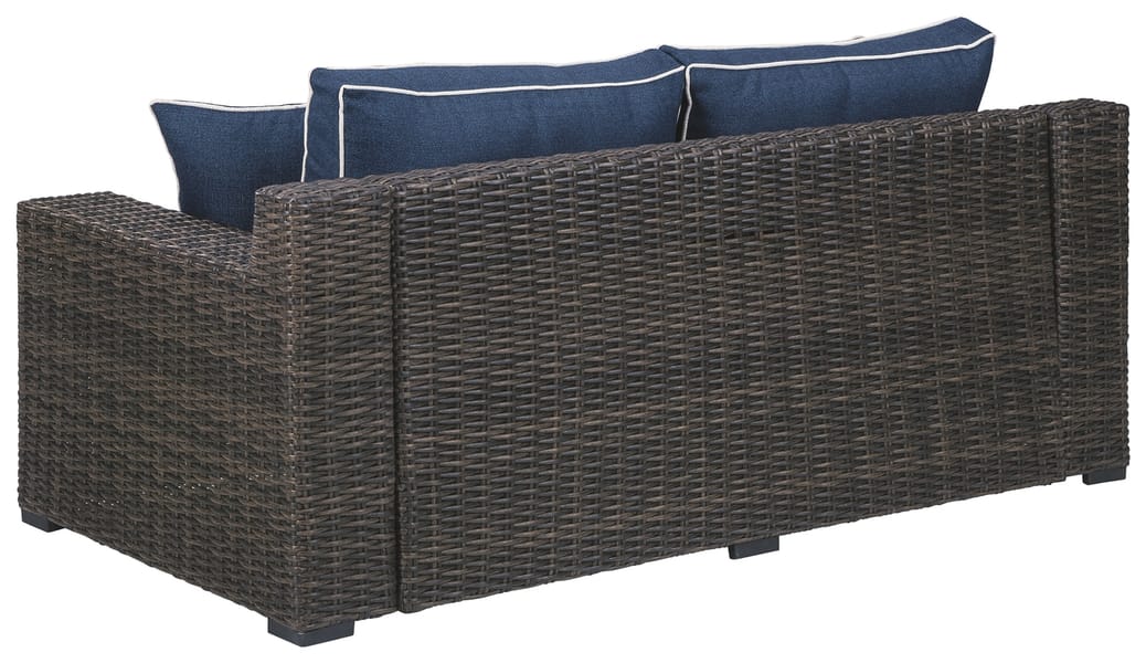Ashley Outdoor/Patio Grasson Lane Loveseat with Cushion P783-835